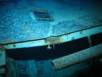 5.9-inch gun concealed on port side below forecastle